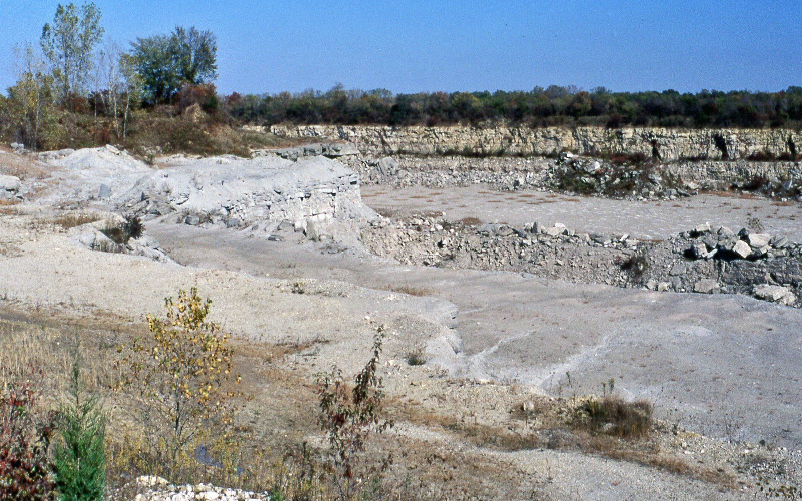 A quarry face with rigging against it